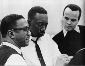 Leonard De Paur, Joe Williams, and Harry Belafonte reviewing a take, C. 1961